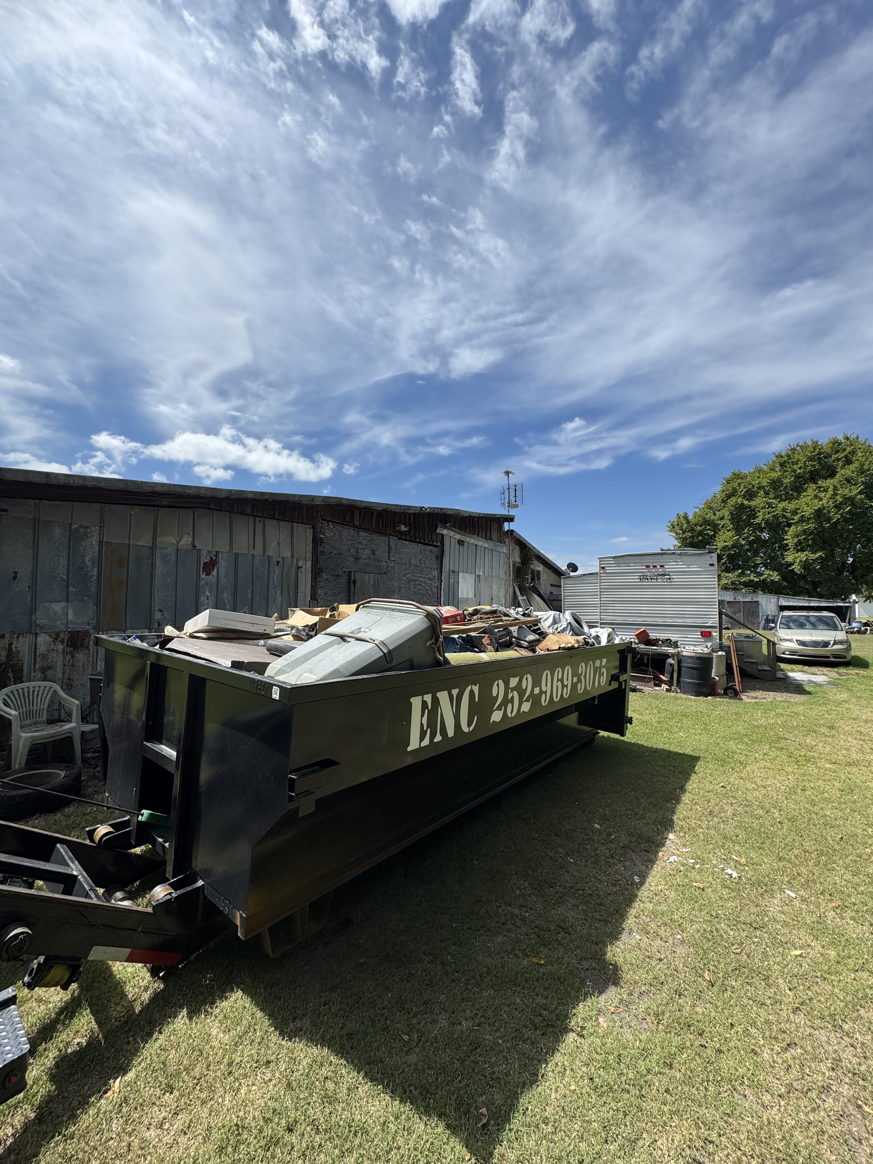 ENC Dumpster loaded with construction debris